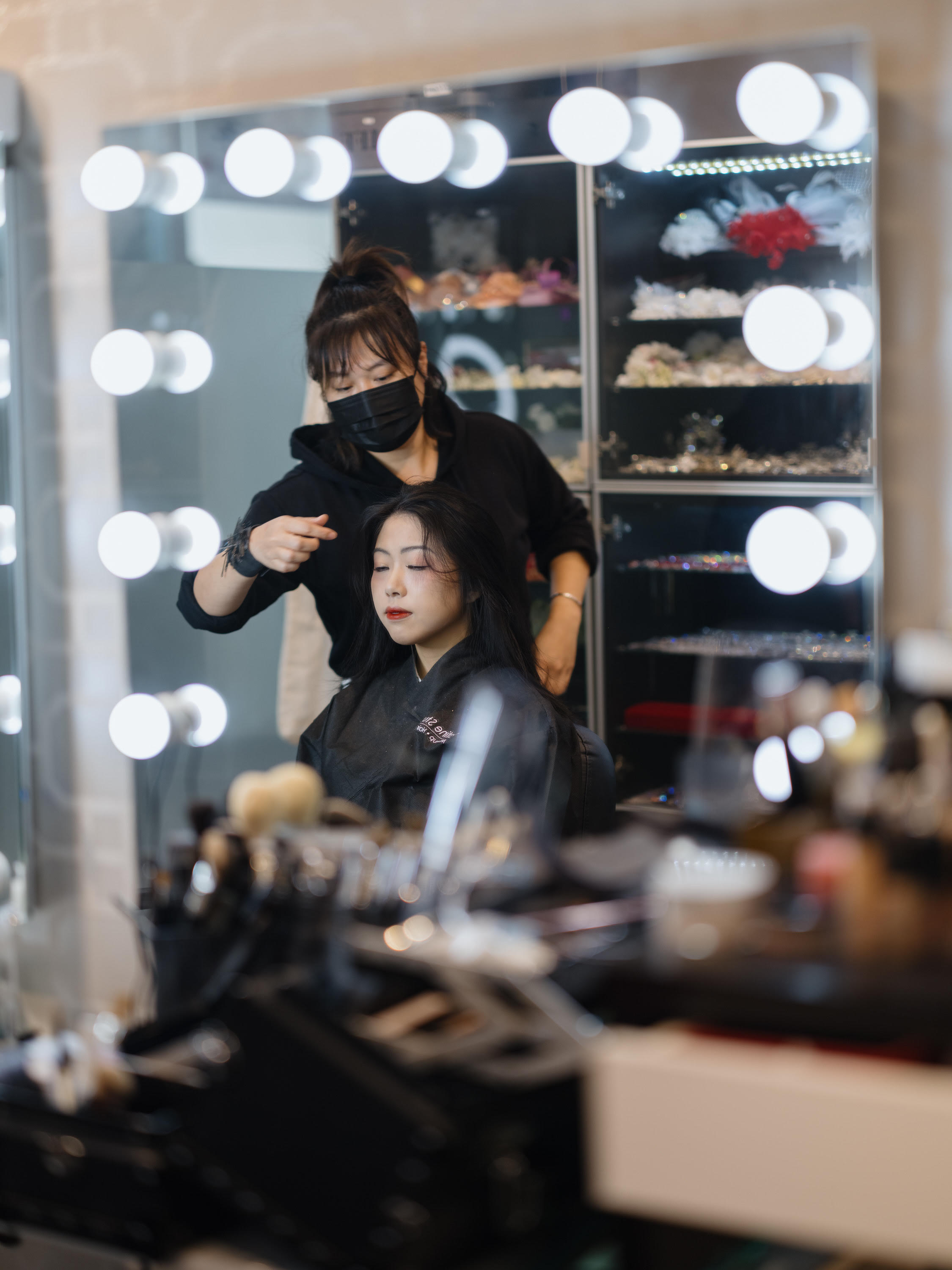 Professional bridal makeup artist working with a Toronto bride at Satine Studio 
